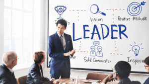 pemimpin bisnis memimpin tim dengan strategi kepemimpinan efektif di kantor modern